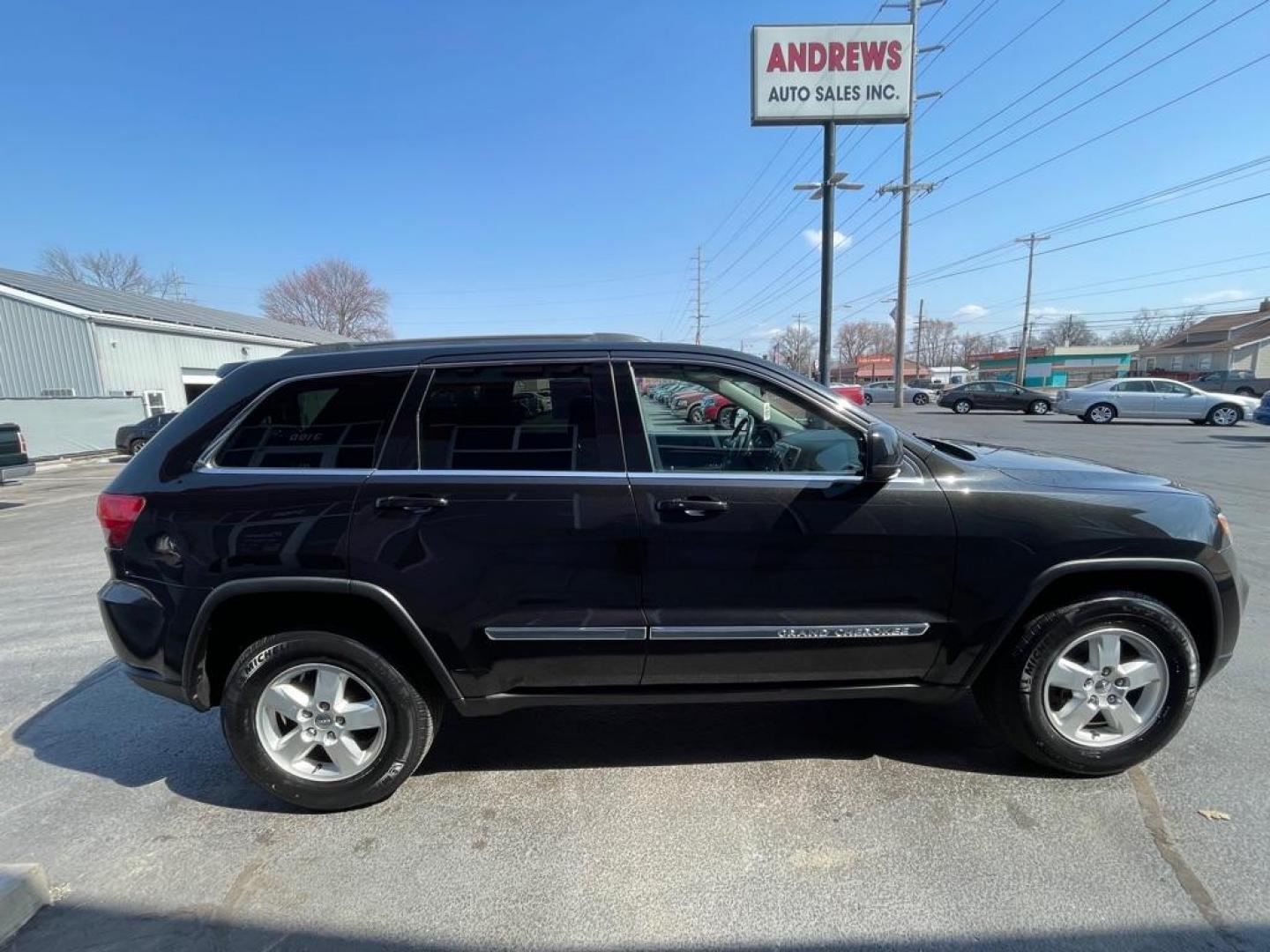 2012 BLACK JEEP GRAND CHEROKEE LAREDO (1C4RJFAG5CC) with an 3.6L engine, Automatic transmission, located at 3100 Covert Avenue, Evansville, IN, 47714, (812) 473-4492, 37.955418, -87.512238 - Photo#2