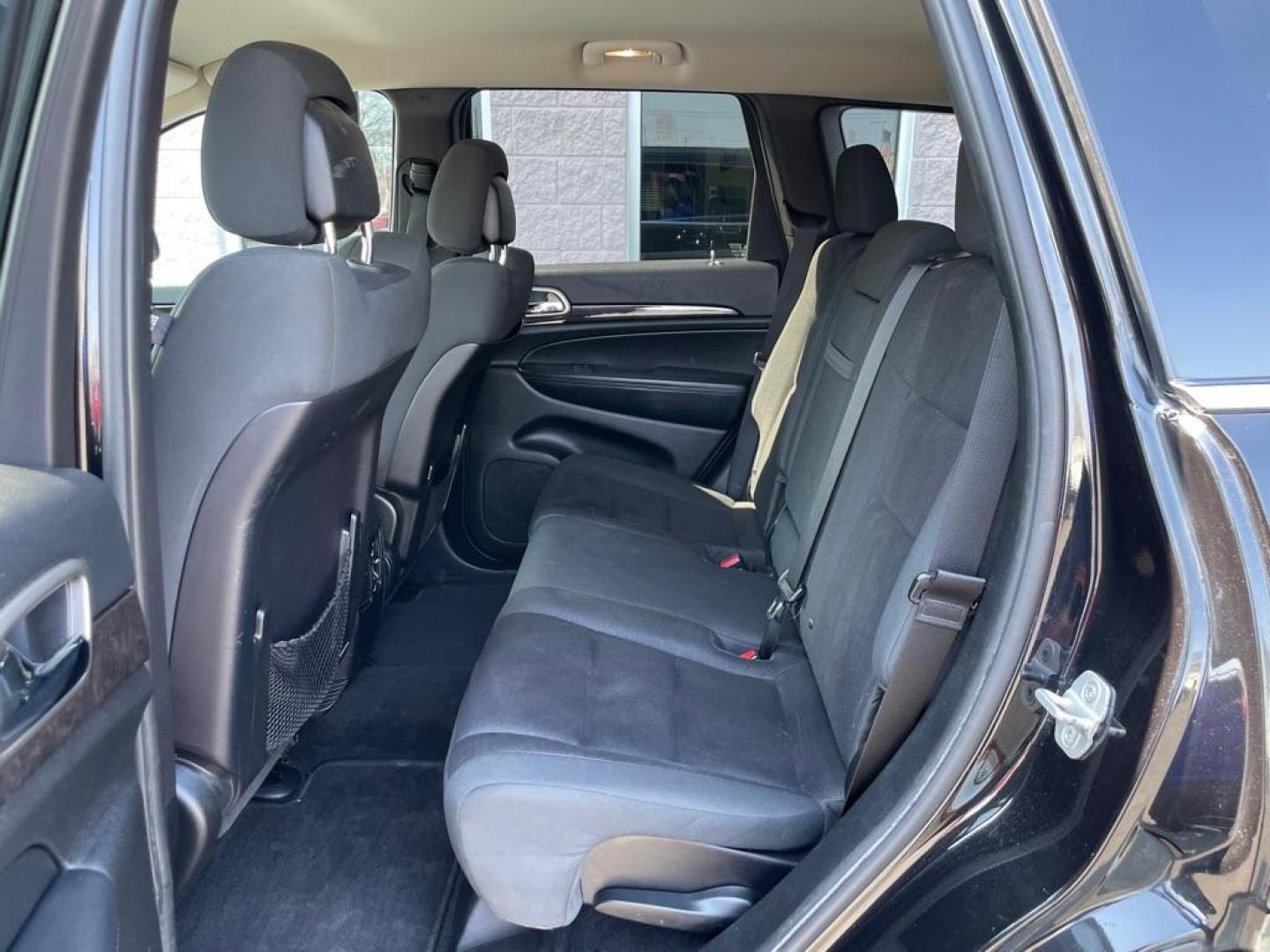 2012 BLACK JEEP GRAND CHEROKEE LAREDO (1C4RJFAG5CC) with an 3.6L engine, Automatic transmission, located at 3100 Covert Avenue, Evansville, IN, 47714, (812) 473-4492, 37.955418, -87.512238 - Photo#6