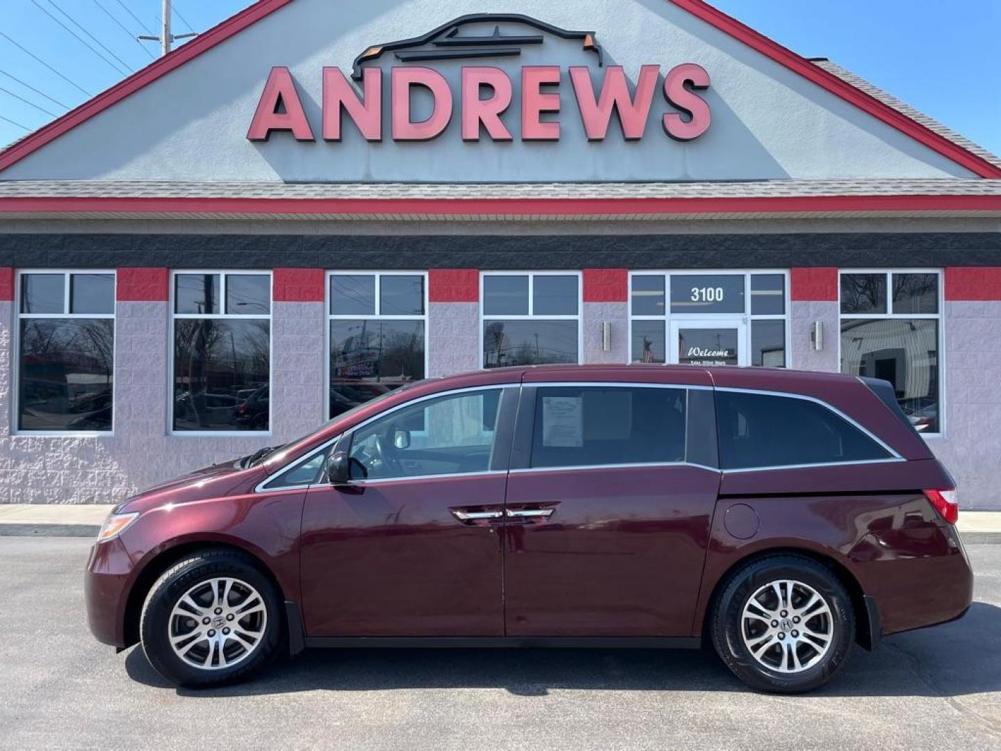 2013 MAROON HONDA ODYSSEY EXL (5FNRL5H63DB) with an 3.5L engine, Automatic transmission, located at 3100 Covert Avenue, Evansville, IN, 47714, (812) 473-4492, 37.955418, -87.512238 - Photo#0