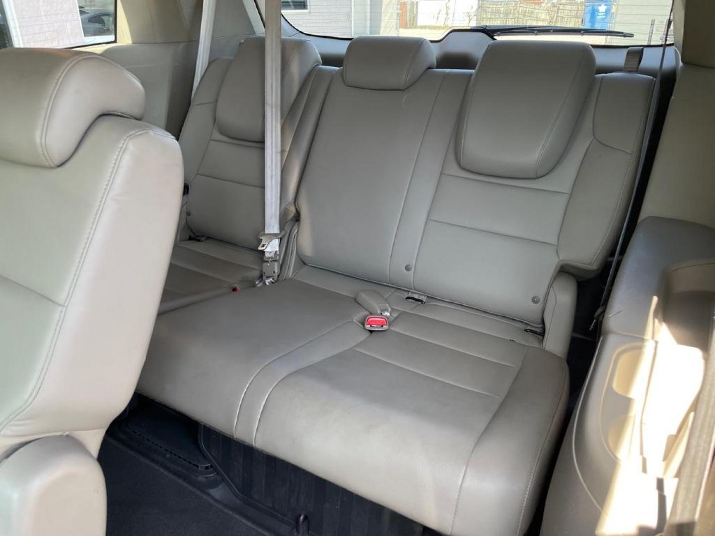 2013 MAROON HONDA ODYSSEY EXL (5FNRL5H63DB) with an 3.5L engine, Automatic transmission, located at 3100 Covert Avenue, Evansville, IN, 47714, (812) 473-4492, 37.955418, -87.512238 - Photo#7