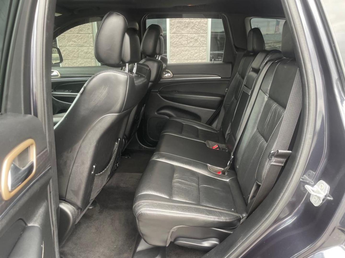 2014 BLUE JEEP GRAND CHEROKEE LIMITED (1C4RJFBGXEC) with an 3.6L engine, Automatic transmission, located at 3100 Covert Avenue, Evansville, IN, 47714, (812) 473-4492, 37.955418, -87.512238 - Photo#7