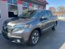 2017 GRAY HONDA RIDGELINE RTL (5FPYK3F50HB) with an 3.5L engine, Automatic transmission, located at 3100 Covert Avenue, Evansville, IN, 47714, (812) 473-4492, 37.955418, -87.512238 - Photo#2