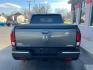 2017 GRAY HONDA RIDGELINE RTL (5FPYK3F50HB) with an 3.5L engine, Automatic transmission, located at 3100 Covert Avenue, Evansville, IN, 47714, (812) 473-4492, 37.955418, -87.512238 - Photo#4