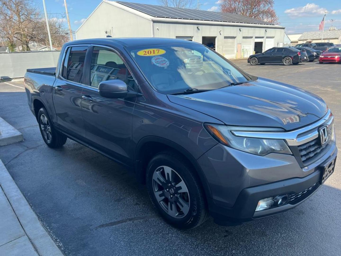 2017 GRAY HONDA RIDGELINE RTL (5FPYK3F50HB) with an 3.5L engine, Automatic transmission, located at 3100 Covert Avenue, Evansville, IN, 47714, (812) 473-4492, 37.955418, -87.512238 - Photo#6