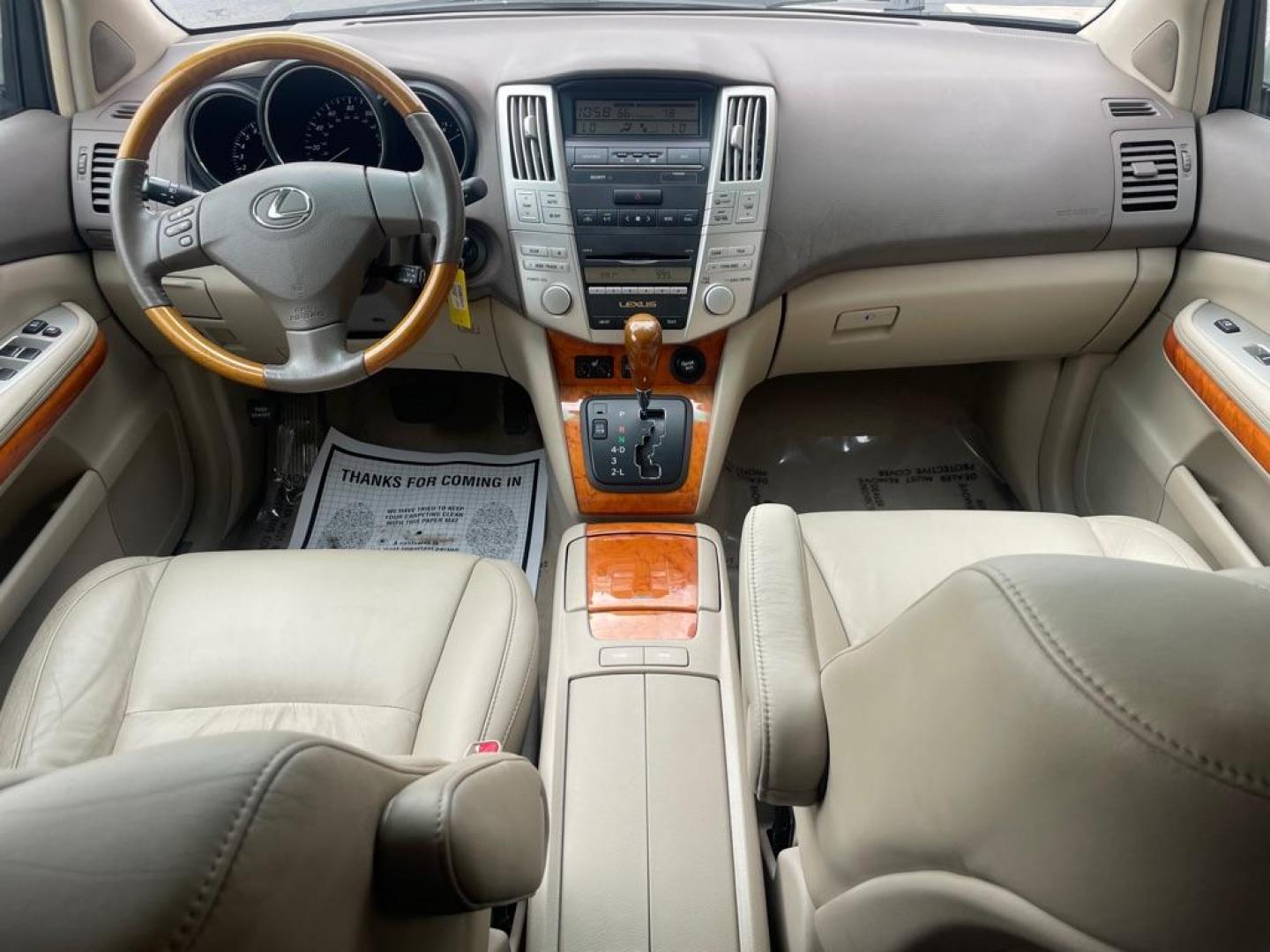 2007 SILVER LEXUS RX 350 (2T2HK31U87C) with an 3.5L engine, Automatic transmission, located at 3100 Covert Avenue, Evansville, IN, 47714, (812) 473-4492, 37.955418, -87.512238 - Photo#4