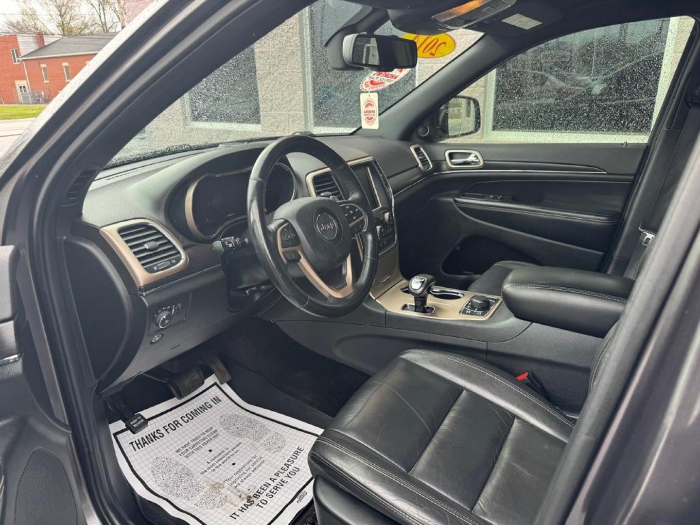 2014 GRAY JEEP GRAND CHEROKEE LIMITED (1C4RJFBG8EC) with an 3.6L engine, Automatic transmission, located at 3100 Covert Avenue, Evansville, IN, 47714, (812) 473-4492, 37.955418, -87.512238 - Photo#4