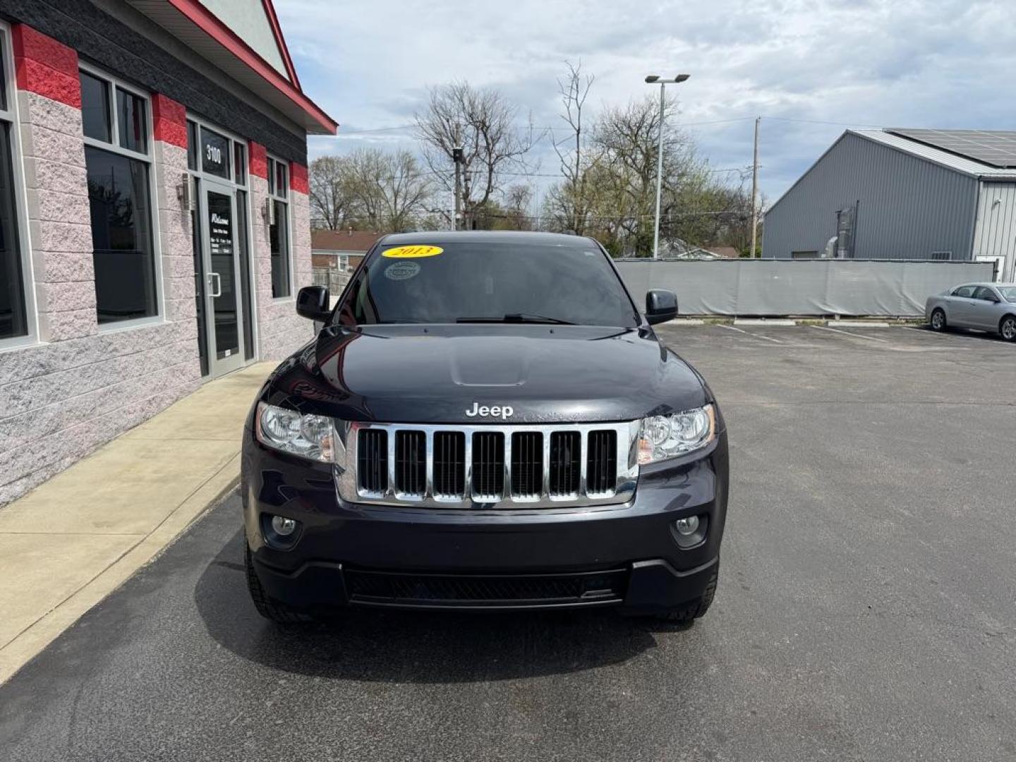 2013 BLACK JEEP GRAND CHEROKEE LAREDO (1C4RJFAG3DC) with an 3.6L engine, Automatic transmission, located at 3100 Covert Avenue, Evansville, IN, 47714, (812) 473-4492, 37.955418, -87.512238 - Photo#1