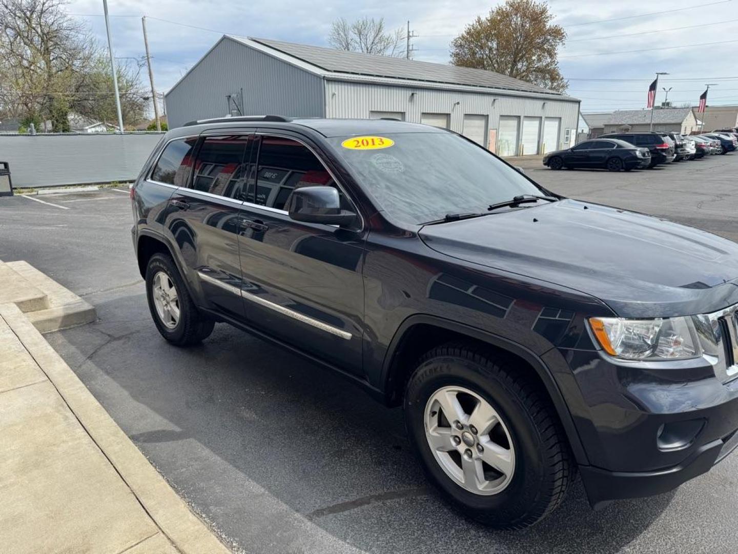 2013 BLACK JEEP GRAND CHEROKEE LAREDO (1C4RJFAG3DC) with an 3.6L engine, Automatic transmission, located at 3100 Covert Avenue, Evansville, IN, 47714, (812) 473-4492, 37.955418, -87.512238 - Photo#2