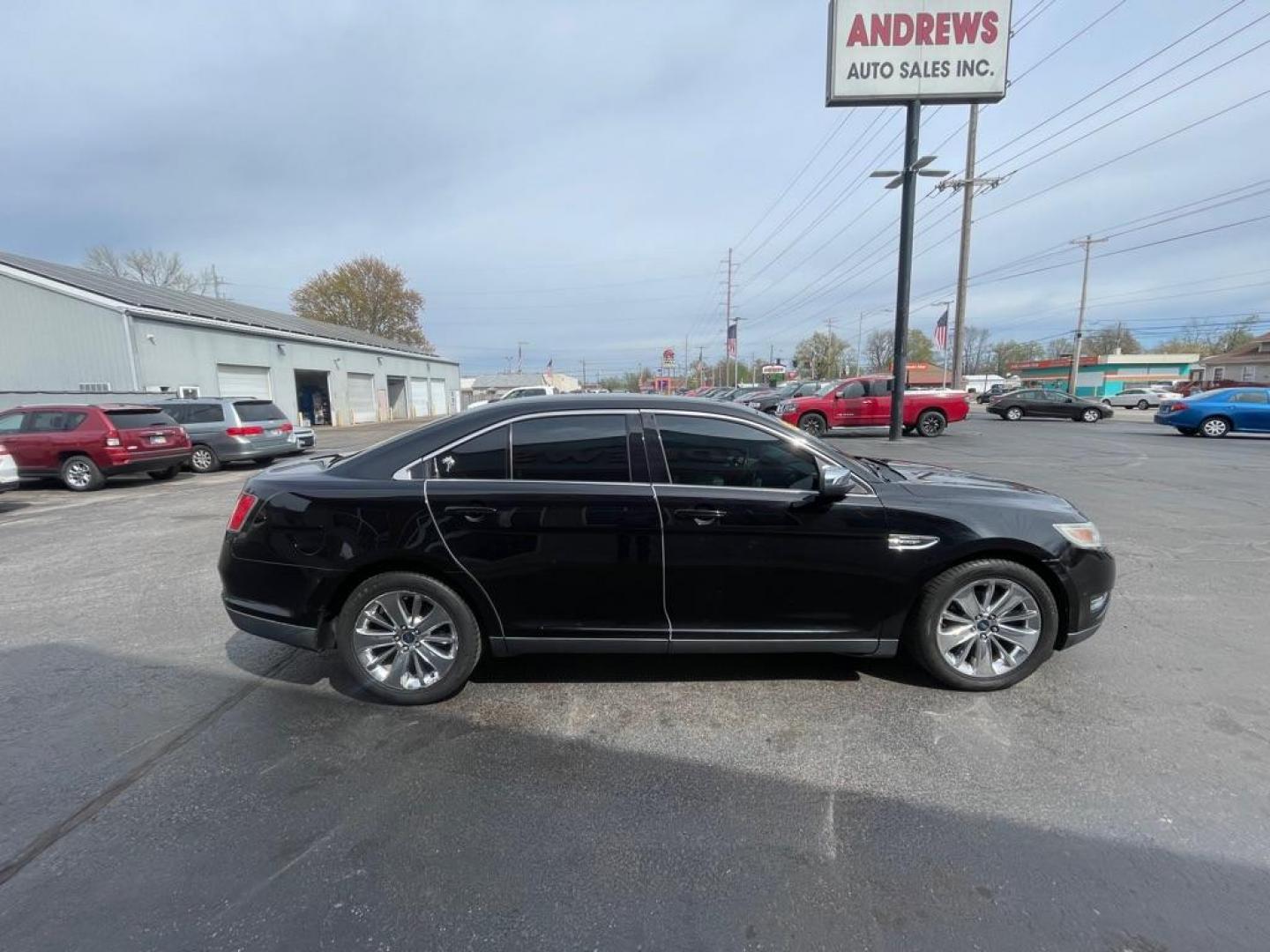2012 BLACK FORD TAURUS LIMITED (1FAHP2FW3CG) with an 3.5L engine, Automatic transmission, located at 3100 Covert Avenue, Evansville, IN, 47714, (812) 473-4492, 37.955418, -87.512238 - Photo#2