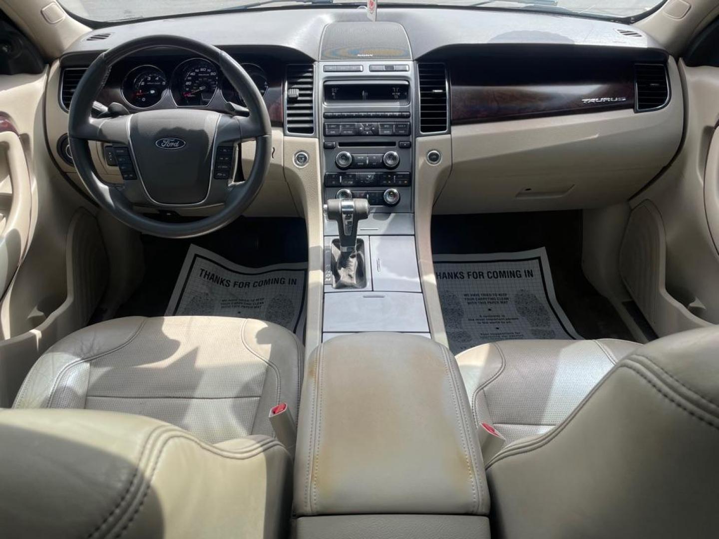 2012 BLACK FORD TAURUS LIMITED (1FAHP2FW3CG) with an 3.5L engine, Automatic transmission, located at 3100 Covert Avenue, Evansville, IN, 47714, (812) 473-4492, 37.955418, -87.512238 - Photo#4