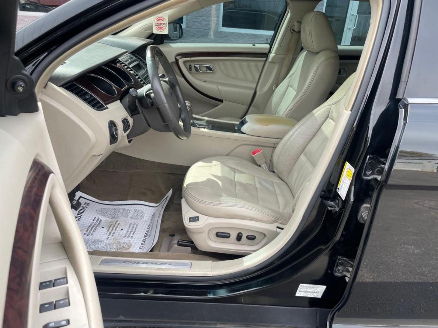 2012 BLACK FORD TAURUS LIMITED (1FAHP2FW3CG) with an 3.5L engine, Automatic transmission, located at 3100 Covert Avenue, Evansville, IN, 47714, (812) 473-4492, 37.955418, -87.512238 - Photo#5