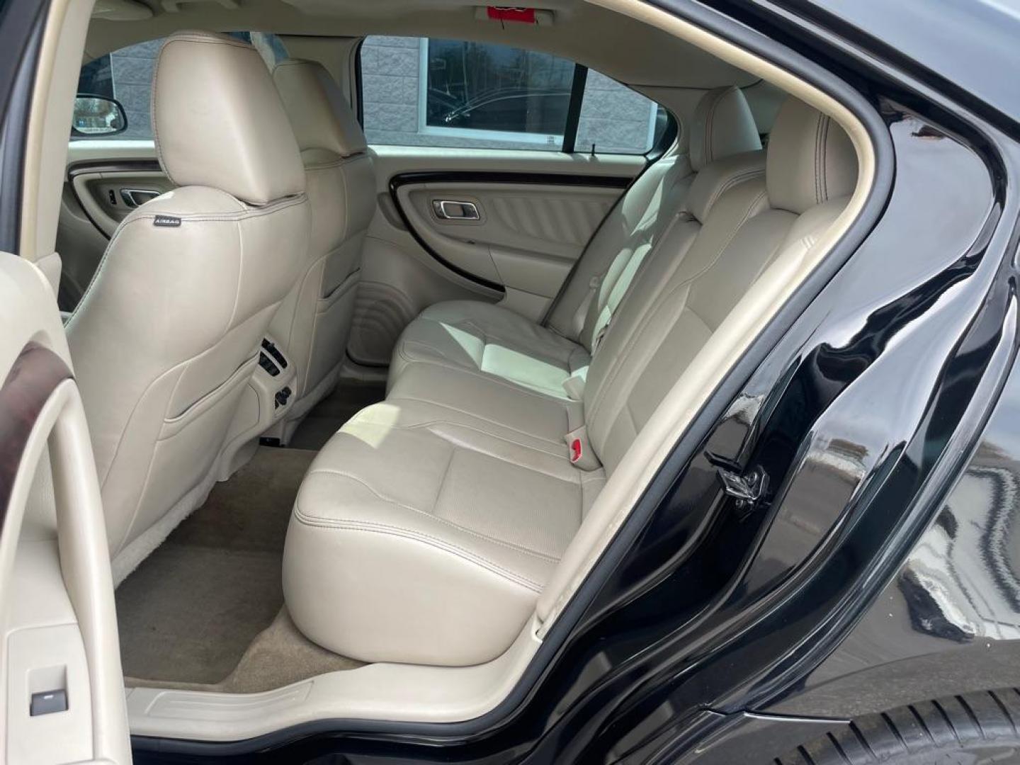 2012 BLACK FORD TAURUS LIMITED (1FAHP2FW3CG) with an 3.5L engine, Automatic transmission, located at 3100 Covert Avenue, Evansville, IN, 47714, (812) 473-4492, 37.955418, -87.512238 - Photo#6