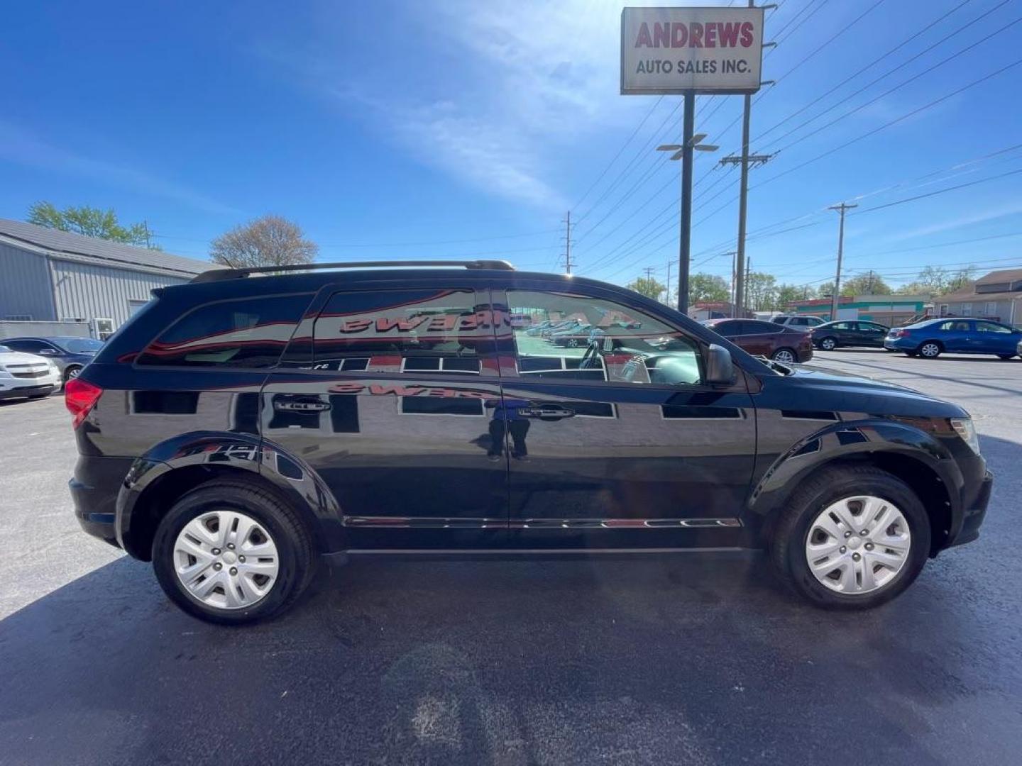 2015 BLACK DODGE JOURNEY SE (3C4PDCAB3FT) with an 2.4L engine, Automatic transmission, located at 3100 Covert Avenue, Evansville, IN, 47714, (812) 473-4492, 37.955418, -87.512238 - Photo#2