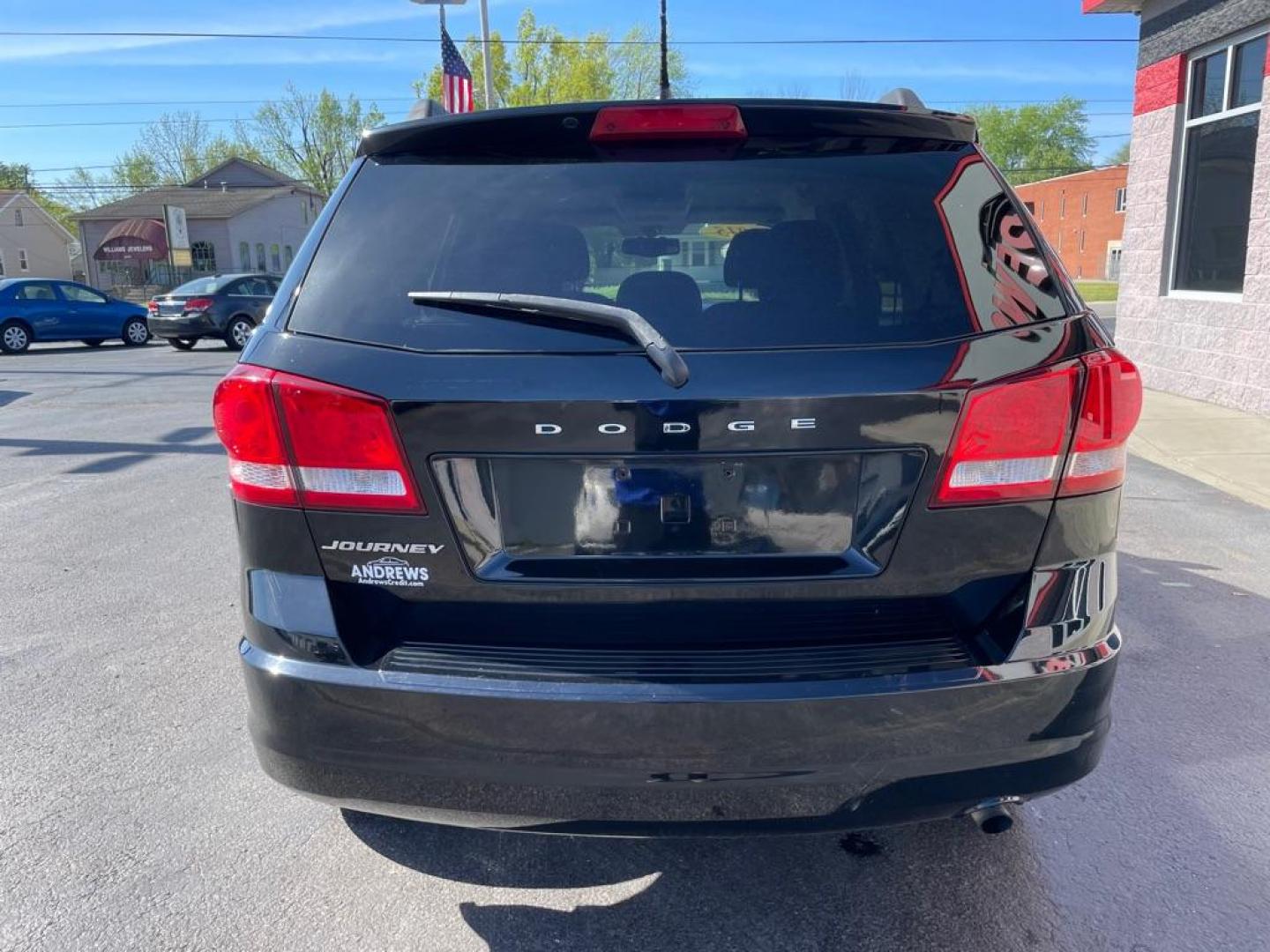 2015 BLACK DODGE JOURNEY SE (3C4PDCAB3FT) with an 2.4L engine, Automatic transmission, located at 3100 Covert Avenue, Evansville, IN, 47714, (812) 473-4492, 37.955418, -87.512238 - Photo#3