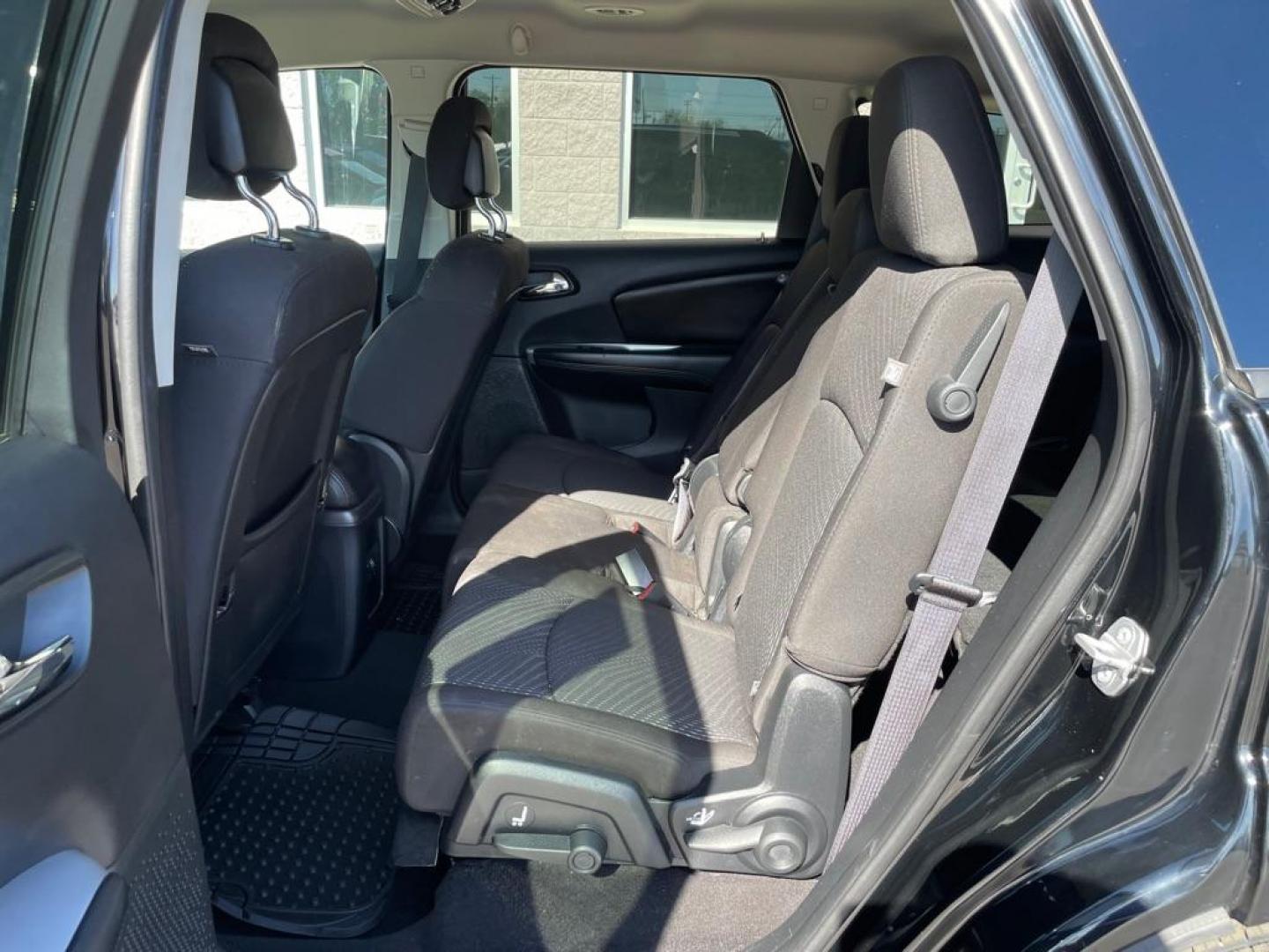 2015 BLACK DODGE JOURNEY SE (3C4PDCAB3FT) with an 2.4L engine, Automatic transmission, located at 3100 Covert Avenue, Evansville, IN, 47714, (812) 473-4492, 37.955418, -87.512238 - Photo#6