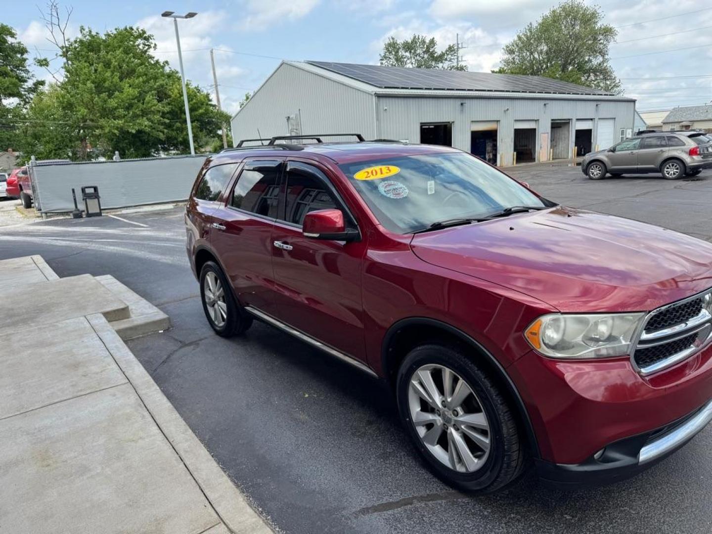 2013 RED DODGE DURANGO CREW (1C4RDJDG0DC) with an 3.6L engine, Automatic transmission, located at 3100 Covert Avenue, Evansville, IN, 47714, (812) 473-4492, 37.955418, -87.512238 - Photo#2