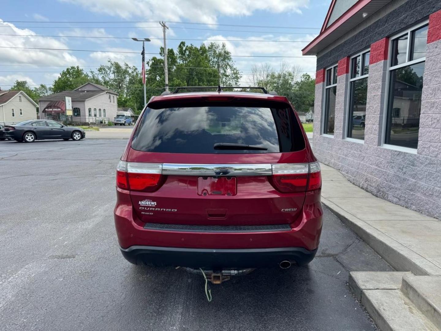 2013 RED DODGE DURANGO CREW (1C4RDJDG0DC) with an 3.6L engine, Automatic transmission, located at 3100 Covert Avenue, Evansville, IN, 47714, (812) 473-4492, 37.955418, -87.512238 - Photo#3