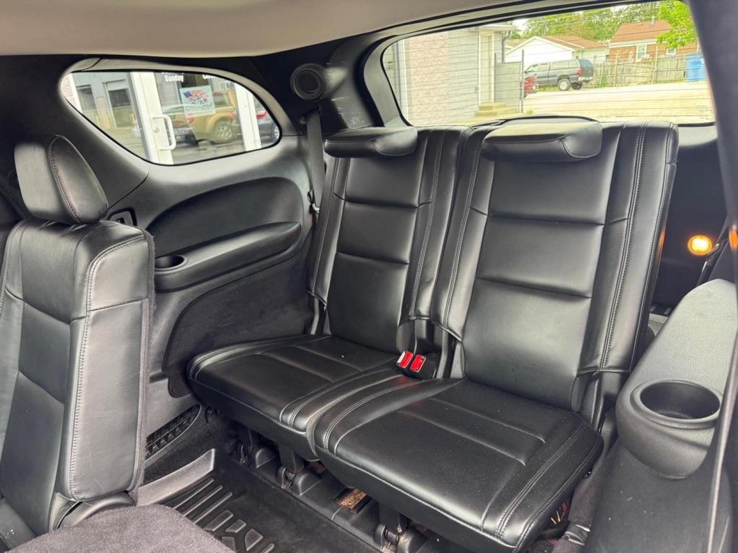 2013 RED DODGE DURANGO CREW (1C4RDJDG0DC) with an 3.6L engine, Automatic transmission, located at 3100 Covert Avenue, Evansville, IN, 47714, (812) 473-4492, 37.955418, -87.512238 - Photo#6