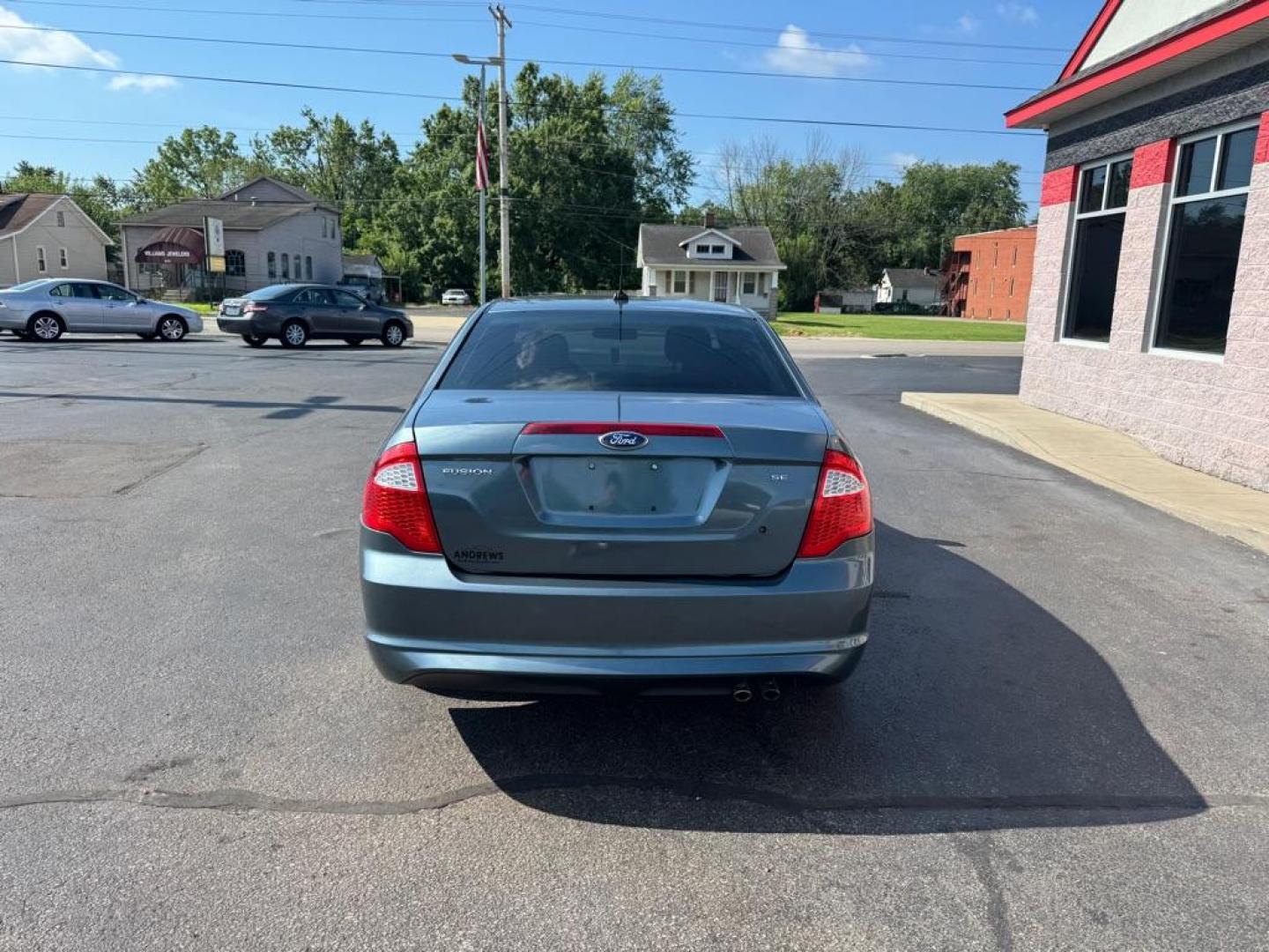2012 BLUE FORD FUSION SE (3FAHP0HA1CR) with an 2.5L engine, Automatic transmission, located at 3100 Covert Avenue, Evansville, IN, 47714, (812) 473-4492, 37.955418, -87.512238 - Photo#3