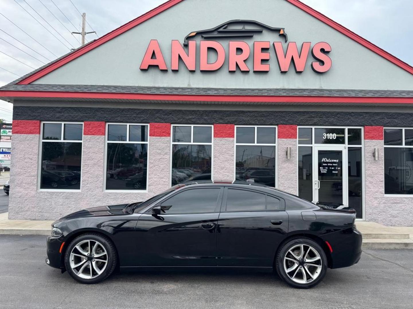 2015 BLACK DODGE CHARGER SXT (2C3CDXHG4FH) with an 3.6L engine, Automatic transmission, located at 3100 Covert Avenue, Evansville, IN, 47714, (812) 473-4492, 37.955418, -87.512238 - Photo#0