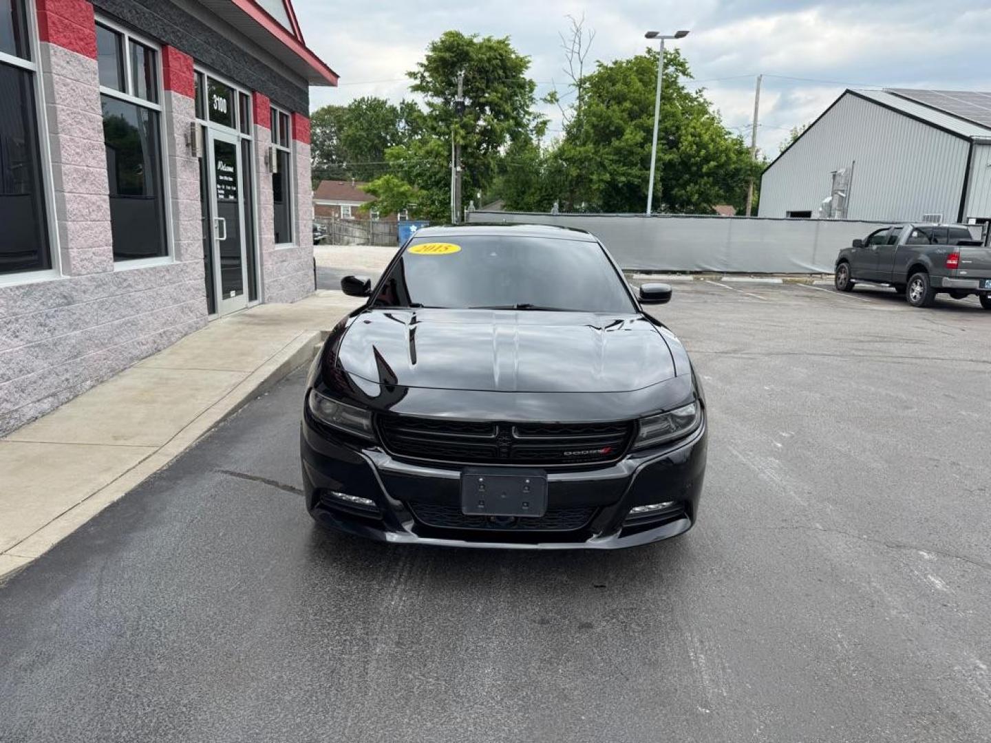 2015 BLACK DODGE CHARGER SXT (2C3CDXHG4FH) with an 3.6L engine, Automatic transmission, located at 3100 Covert Avenue, Evansville, IN, 47714, (812) 473-4492, 37.955418, -87.512238 - Photo#1