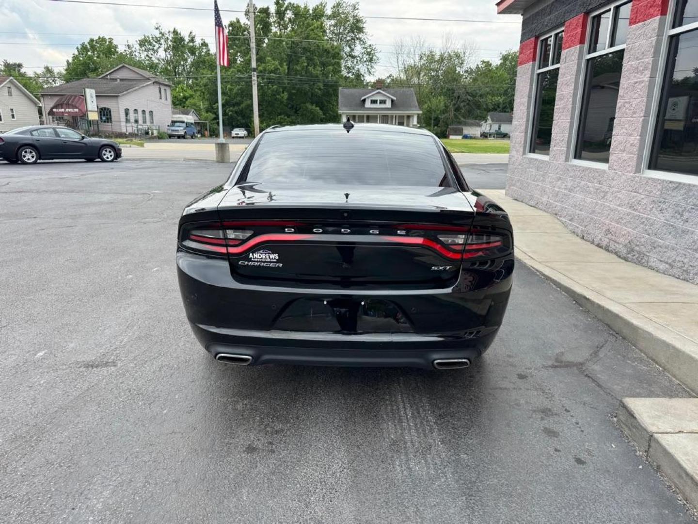 2015 BLACK DODGE CHARGER SXT (2C3CDXHG4FH) with an 3.6L engine, Automatic transmission, located at 3100 Covert Avenue, Evansville, IN, 47714, (812) 473-4492, 37.955418, -87.512238 - Photo#3