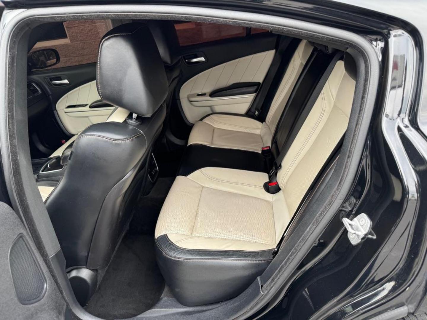 2015 BLACK DODGE CHARGER SXT (2C3CDXHG4FH) with an 3.6L engine, Automatic transmission, located at 3100 Covert Avenue, Evansville, IN, 47714, (812) 473-4492, 37.955418, -87.512238 - Photo#5