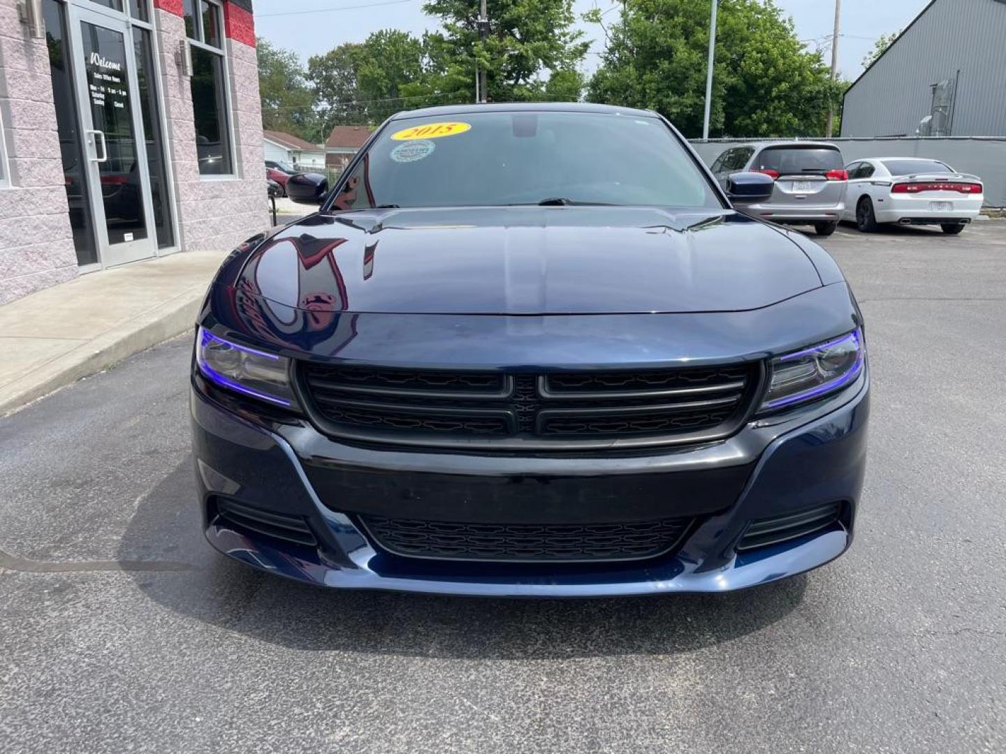 2015 BLUE DODGE CHARGER SE (2C3CDXBG4FH) with an 3.6L engine, Automatic transmission, located at 3100 Covert Avenue, Evansville, IN, 47714, (812) 473-4492, 37.955418, -87.512238 - Photo#1