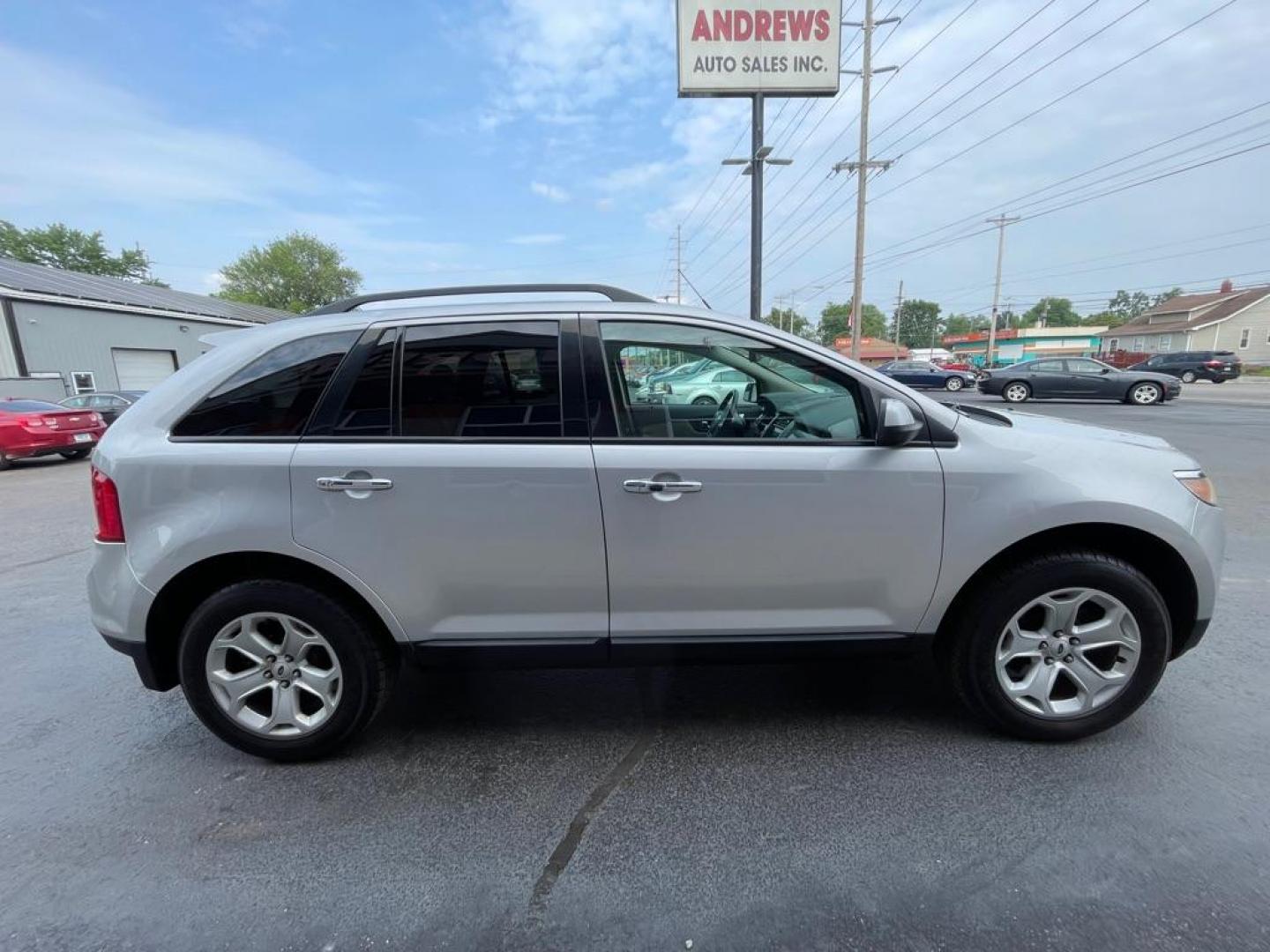 2011 SILVER FORD EDGE SEL (2FMDK4JC2BB) with an 3.5L engine, Automatic transmission, located at 3100 Covert Avenue, Evansville, IN, 47714, (812) 473-4492, 37.955418, -87.512238 - Photo#2