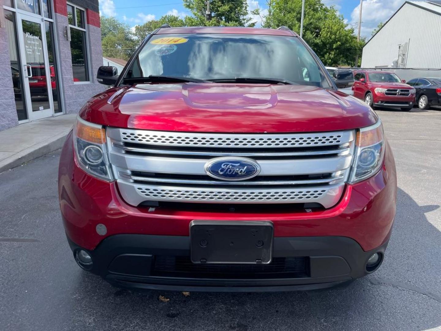 2014 RED FORD EXPLORER XLT (1FM5K7D80EG) with an 3.5L engine, Automatic transmission, located at 3100 Covert Avenue, Evansville, IN, 47714, (812) 473-4492, 37.955418, -87.512238 - Photo#1