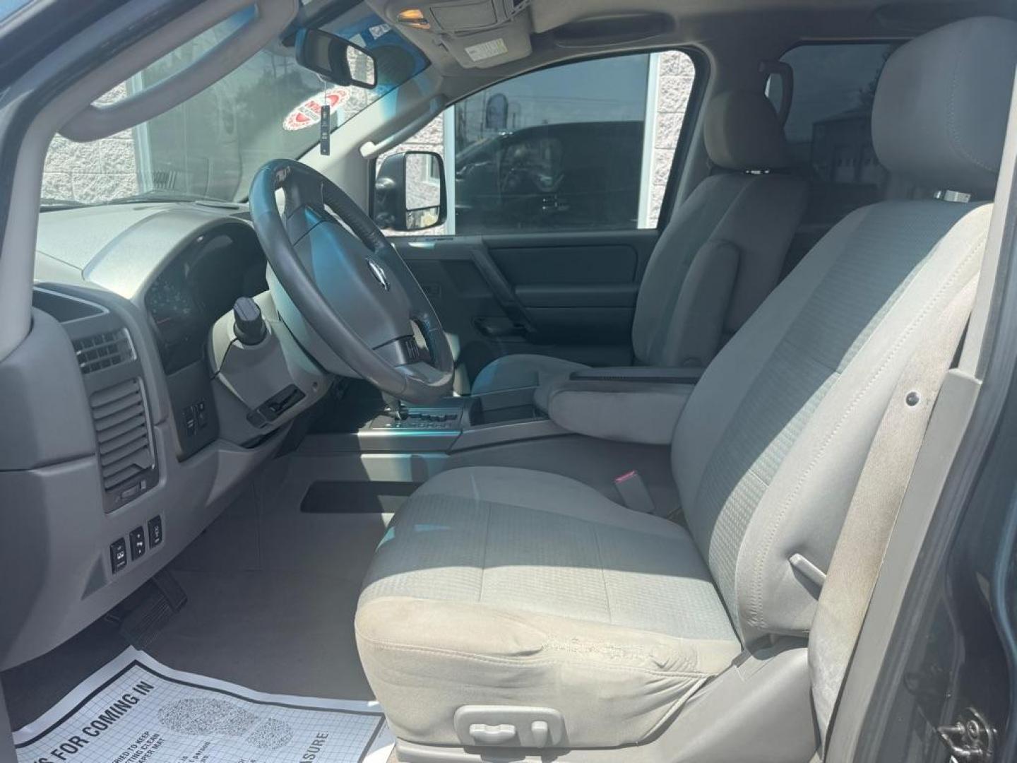 2007 GREEN NISSAN TITAN XE (1N6AA07B47N) with an 5.6L engine, Automatic transmission, located at 3100 Covert Avenue, Evansville, IN, 47714, (812) 473-4492, 37.955418, -87.512238 - Photo#6
