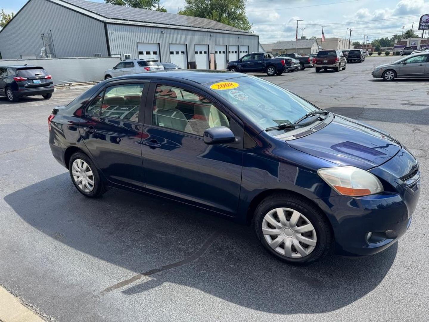2008 BLUE TOYOTA YARIS (JTDBT923881) with an 1.5L engine, Automatic transmission, located at 3100 Covert Avenue, Evansville, IN, 47714, (812) 473-4492, 37.955418, -87.512238 - Photo#2