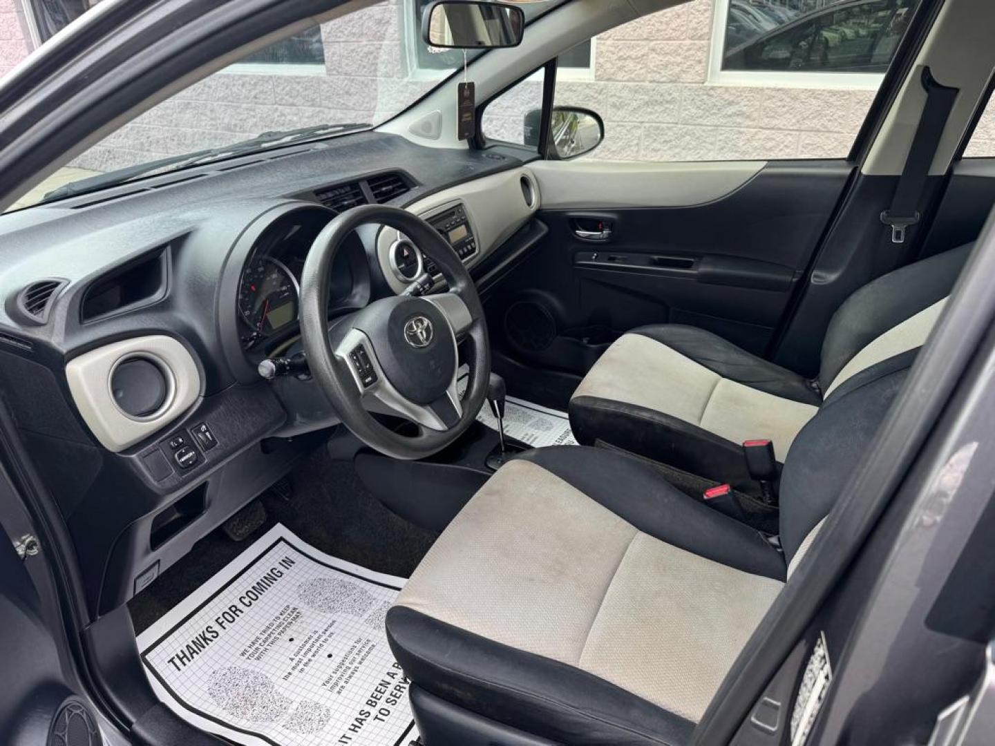 2012 GRAY TOYOTA YARIS (JTDKTUD31CD) with an 1.5L engine, Automatic transmission, located at 3100 Covert Avenue, Evansville, IN, 47714, (812) 473-4492, 37.955418, -87.512238 - Photo#4