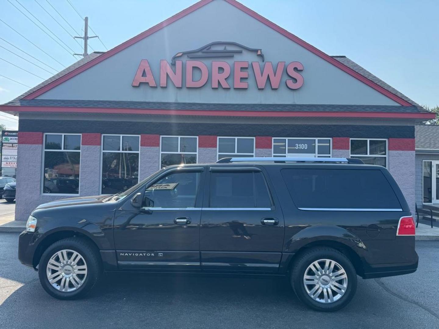 2014 BLACK LINCOLN NAVIGATOR L (5LMJJ3J52EE) with an 5.4L engine, Automatic transmission, located at 3100 Covert Avenue, Evansville, IN, 47714, (812) 473-4492, 37.955418, -87.512238 - Photo#0