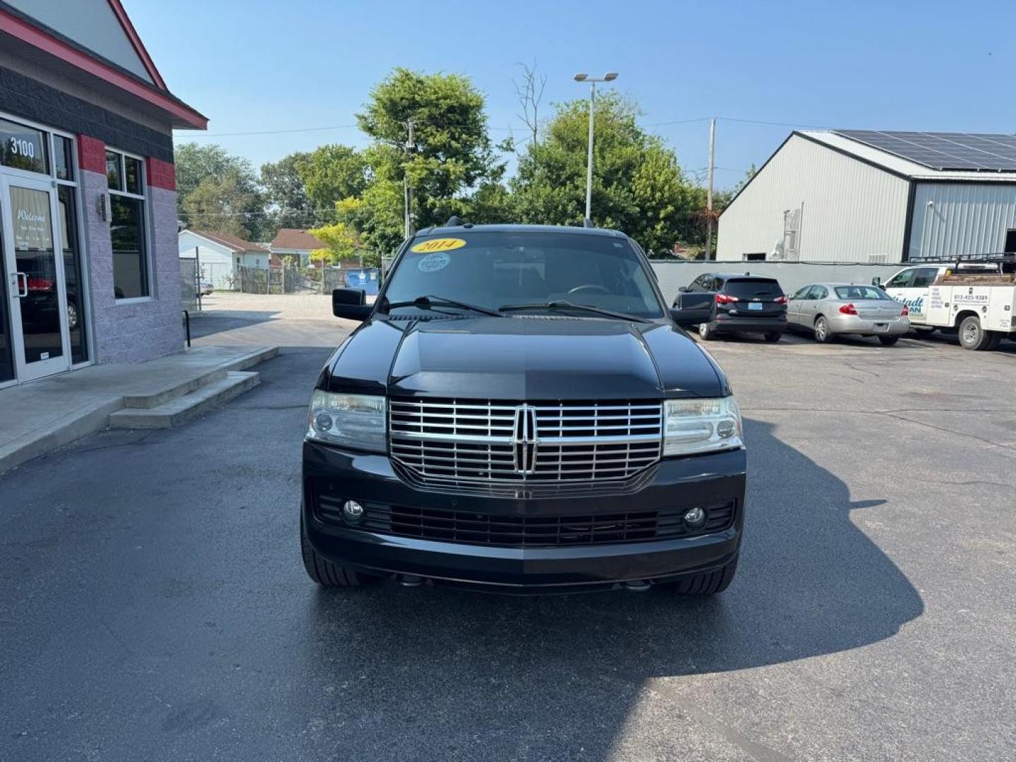 2014 BLACK LINCOLN NAVIGATOR L (5LMJJ3J52EE) with an 5.4L engine, Automatic transmission, located at 3100 Covert Avenue, Evansville, IN, 47714, (812) 473-4492, 37.955418, -87.512238 - Photo#1