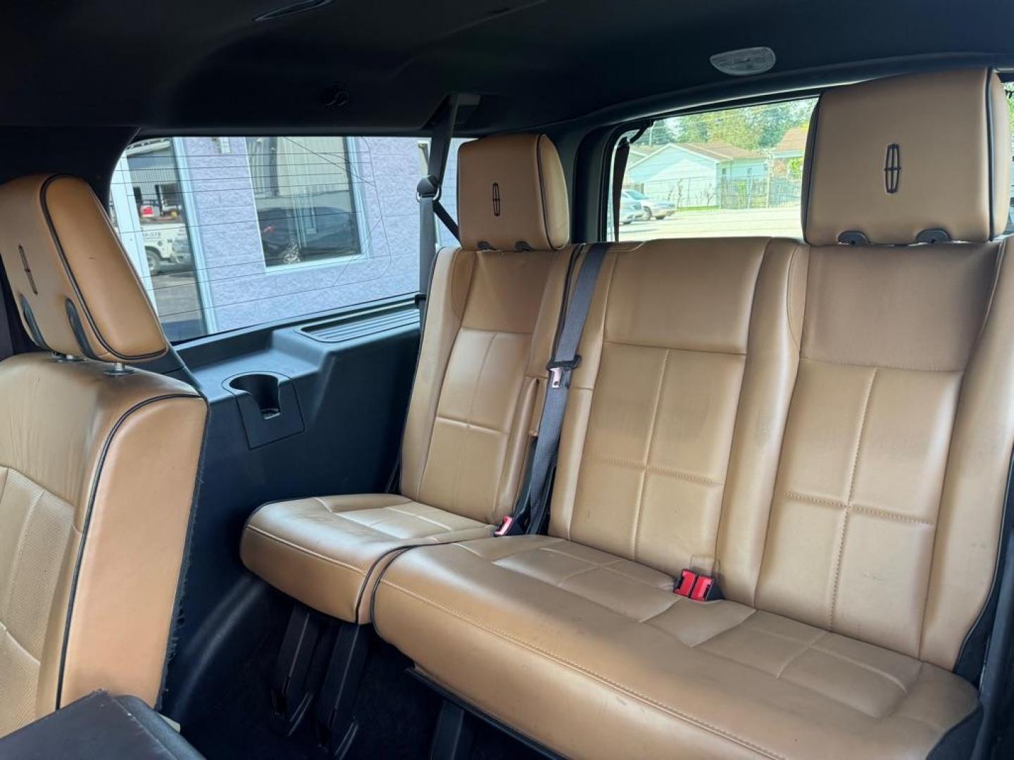 2014 BLACK LINCOLN NAVIGATOR L (5LMJJ3J52EE) with an 5.4L engine, Automatic transmission, located at 3100 Covert Avenue, Evansville, IN, 47714, (812) 473-4492, 37.955418, -87.512238 - Photo#6