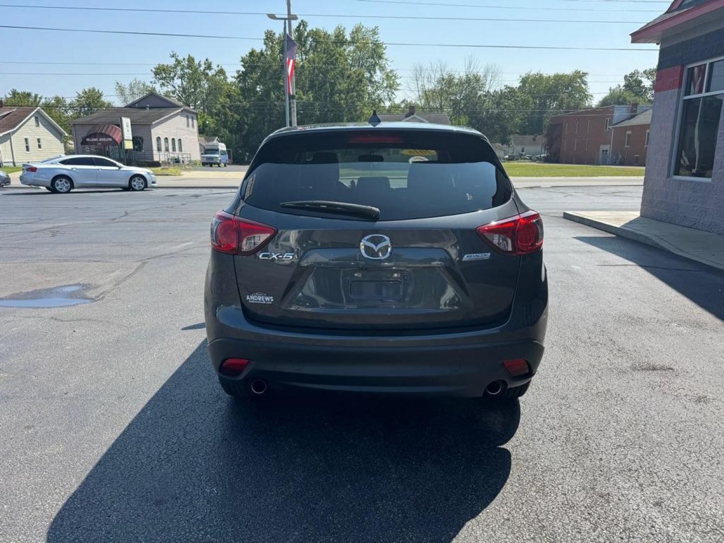 2016 SILVER MAZDA CX-5 TOURING (JM3KE2CY2G0) with an 2.5L engine, Automatic transmission, located at 3100 Covert Avenue, Evansville, IN, 47714, (812) 473-4492, 37.955418, -87.512238 - Photo#3