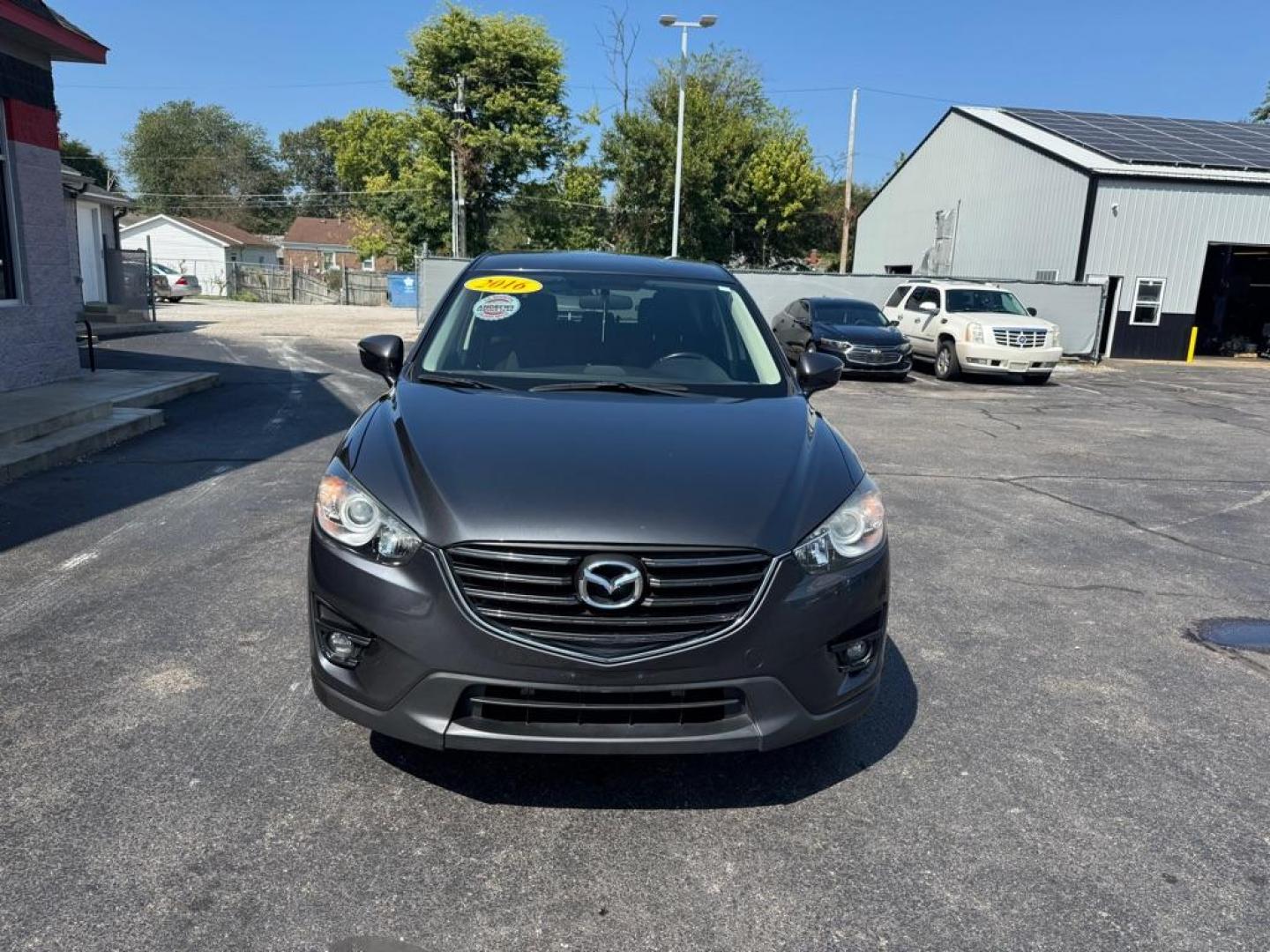 2016 SILVER MAZDA CX-5 TOURING (JM3KE2CY2G0) with an 2.5L engine, Automatic transmission, located at 3100 Covert Avenue, Evansville, IN, 47714, (812) 473-4492, 37.955418, -87.512238 - Photo#1
