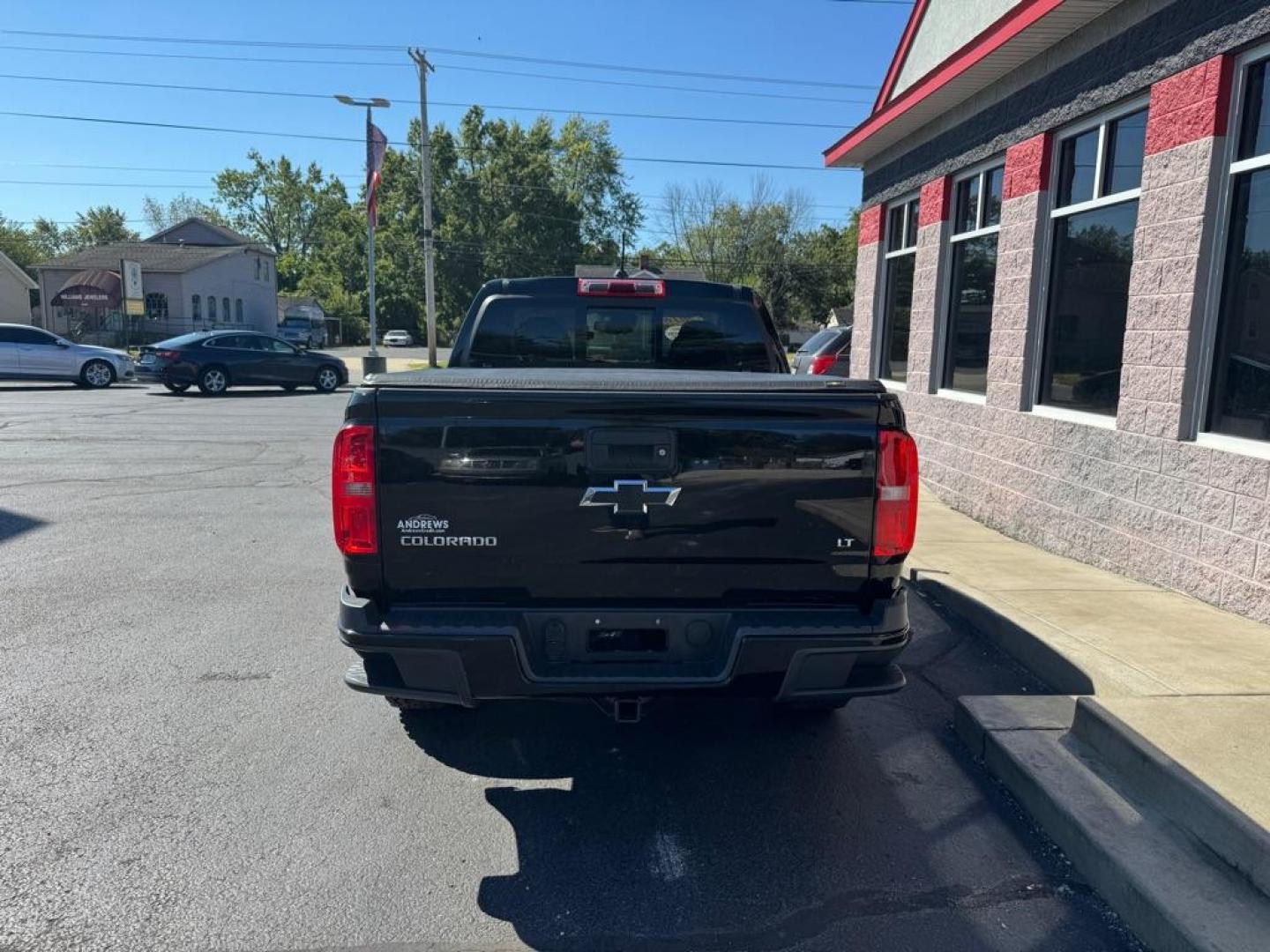 2016 BLACK CHEVROLET COLORADO LT (1GCGTCE35G1) with an 3.6L engine, Automatic transmission, located at 3100 Covert Avenue, Evansville, IN, 47714, (812) 473-4492, 37.955418, -87.512238 - Photo#3