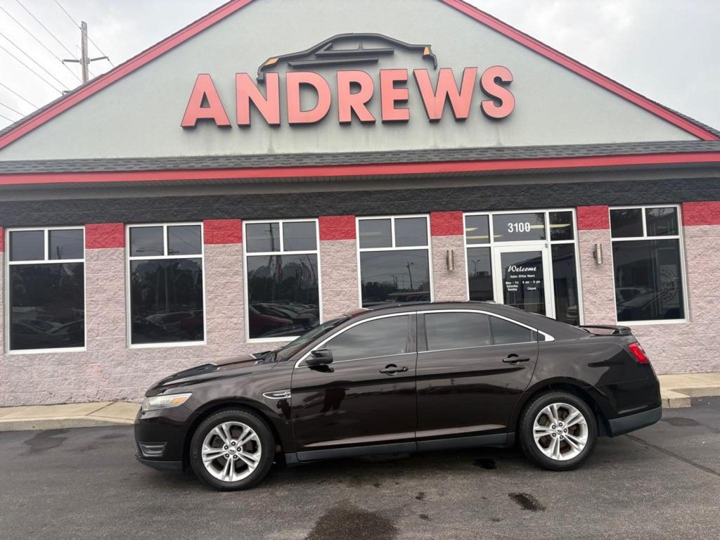 2013 BLACK FORD TAURUS SEL (1FAHP2E82DG) with an 3.5L engine, Automatic transmission, located at 3100 Covert Avenue, Evansville, IN, 47714, (812) 473-4492, 37.955418, -87.512238 - Photo#0