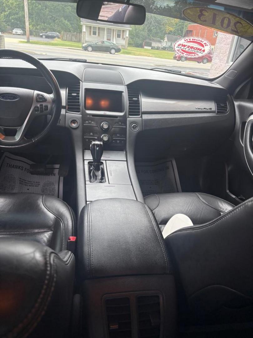 2013 BLACK FORD TAURUS SEL (1FAHP2E82DG) with an 3.5L engine, Automatic transmission, located at 3100 Covert Avenue, Evansville, IN, 47714, (812) 473-4492, 37.955418, -87.512238 - Photo#5