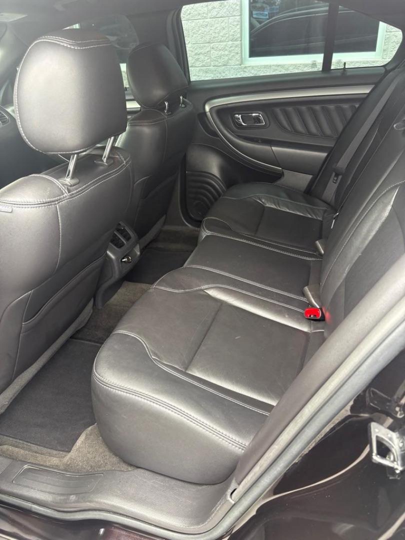 2013 BLACK FORD TAURUS SEL (1FAHP2E82DG) with an 3.5L engine, Automatic transmission, located at 3100 Covert Avenue, Evansville, IN, 47714, (812) 473-4492, 37.955418, -87.512238 - Photo#6