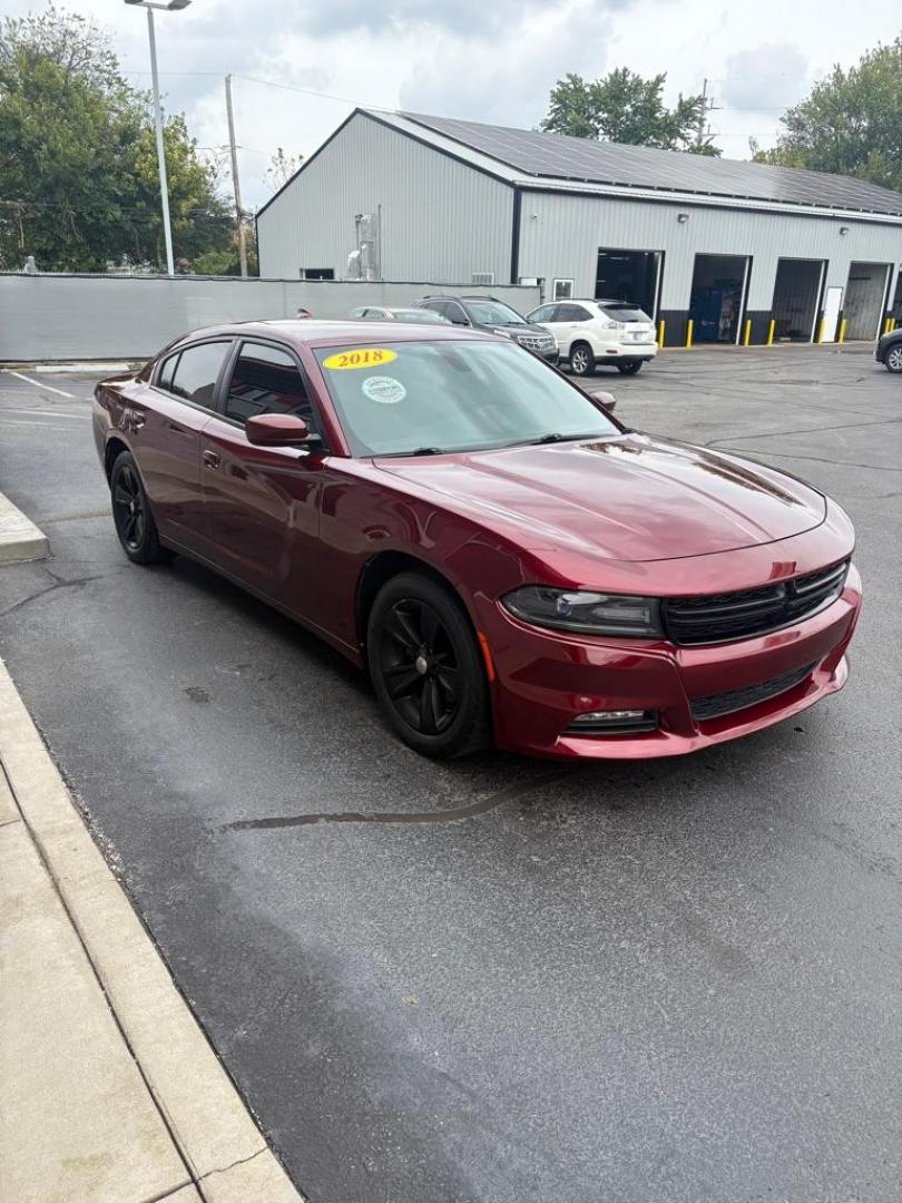2018 RED DODGE CHARGER SXT PLUS (2C3CDXHG2JH) with an 3.6L engine, Automatic transmission, located at 3100 Covert Avenue, Evansville, IN, 47714, (812) 473-4492, 37.955418, -87.512238 - Photo#2