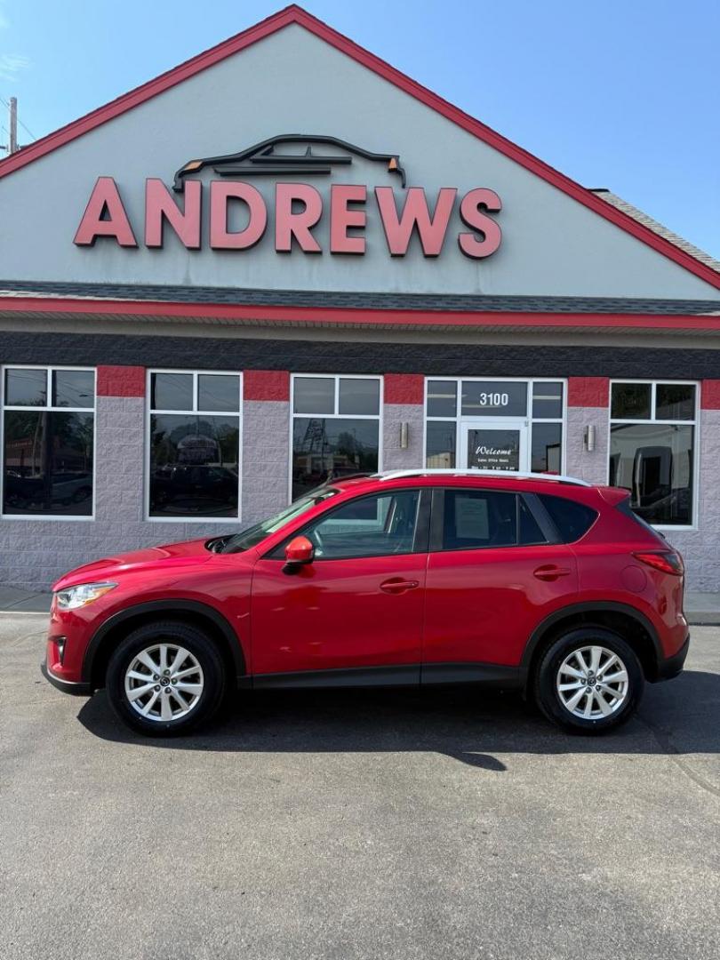 2014 RED MAZDA CX-5 TOURING (JM3KE2CY1E0) with an 2.5L engine, Automatic transmission, located at 3100 Covert Avenue, Evansville, IN, 47714, (812) 473-4492, 37.955418, -87.512238 - Photo#0