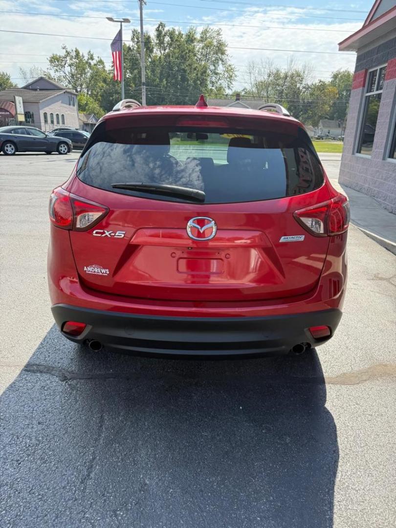 2014 RED MAZDA CX-5 TOURING (JM3KE2CY1E0) with an 2.5L engine, Automatic transmission, located at 3100 Covert Avenue, Evansville, IN, 47714, (812) 473-4492, 37.955418, -87.512238 - Photo#3