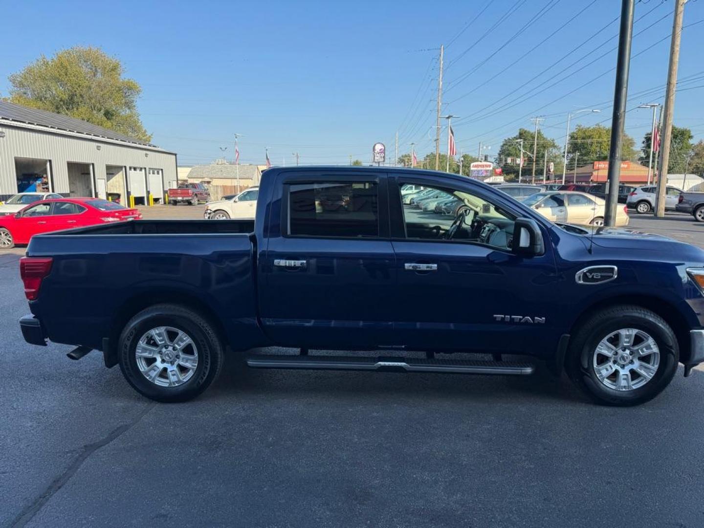 2017 BLUE NISSAN TITAN SV (1N6AA1E66HN) with an 5.6L engine, Automatic transmission, located at 3100 Covert Avenue, Evansville, IN, 47714, (812) 473-4492, 37.955418, -87.512238 - Photo#2