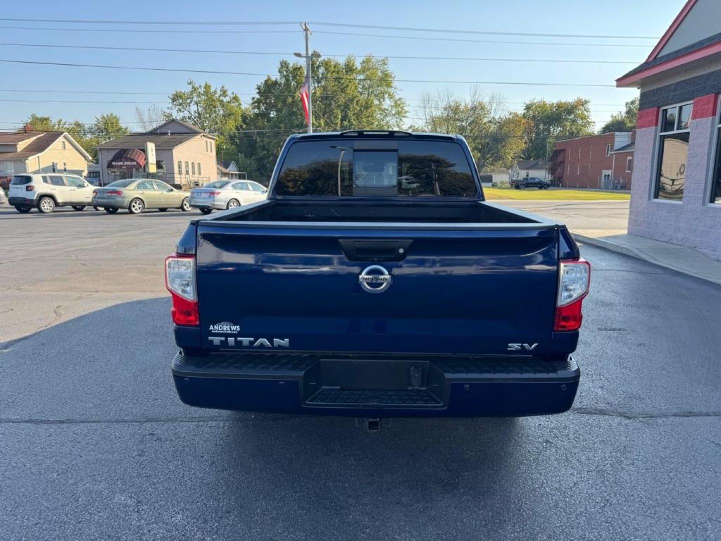 2017 BLUE NISSAN TITAN SV (1N6AA1E66HN) with an 5.6L engine, Automatic transmission, located at 3100 Covert Avenue, Evansville, IN, 47714, (812) 473-4492, 37.955418, -87.512238 - Photo#3