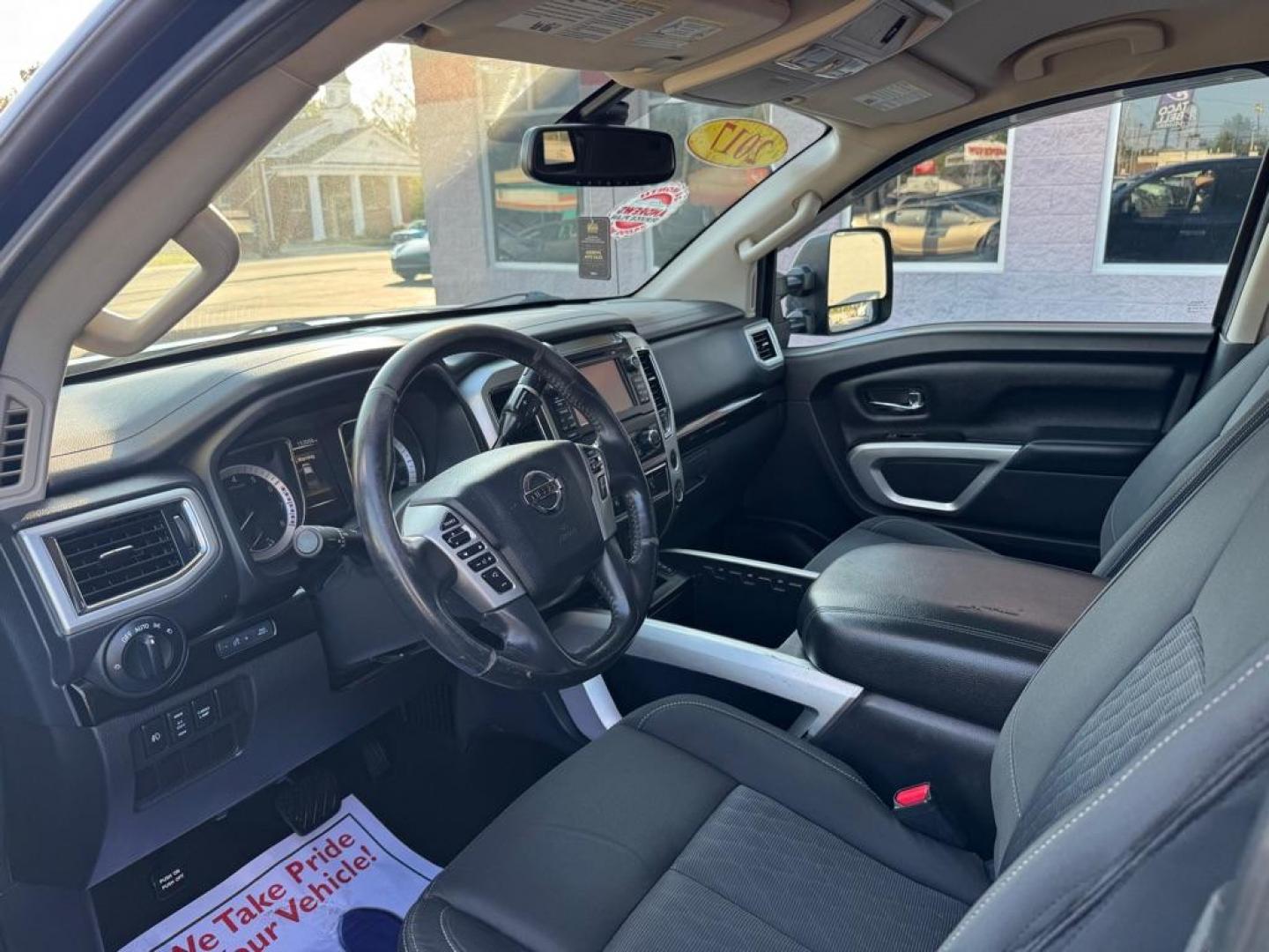 2017 BLUE NISSAN TITAN SV (1N6AA1E66HN) with an 5.6L engine, Automatic transmission, located at 3100 Covert Avenue, Evansville, IN, 47714, (812) 473-4492, 37.955418, -87.512238 - Photo#4