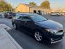 2014 BLACK TOYOTA CAMRY L (4T1BF1FKXEU) with an 2.5L engine, Automatic transmission, located at 3100 Covert Avenue, Evansville, IN, 47714, (812) 473-4492, 37.955418, -87.512238 - Photo#2