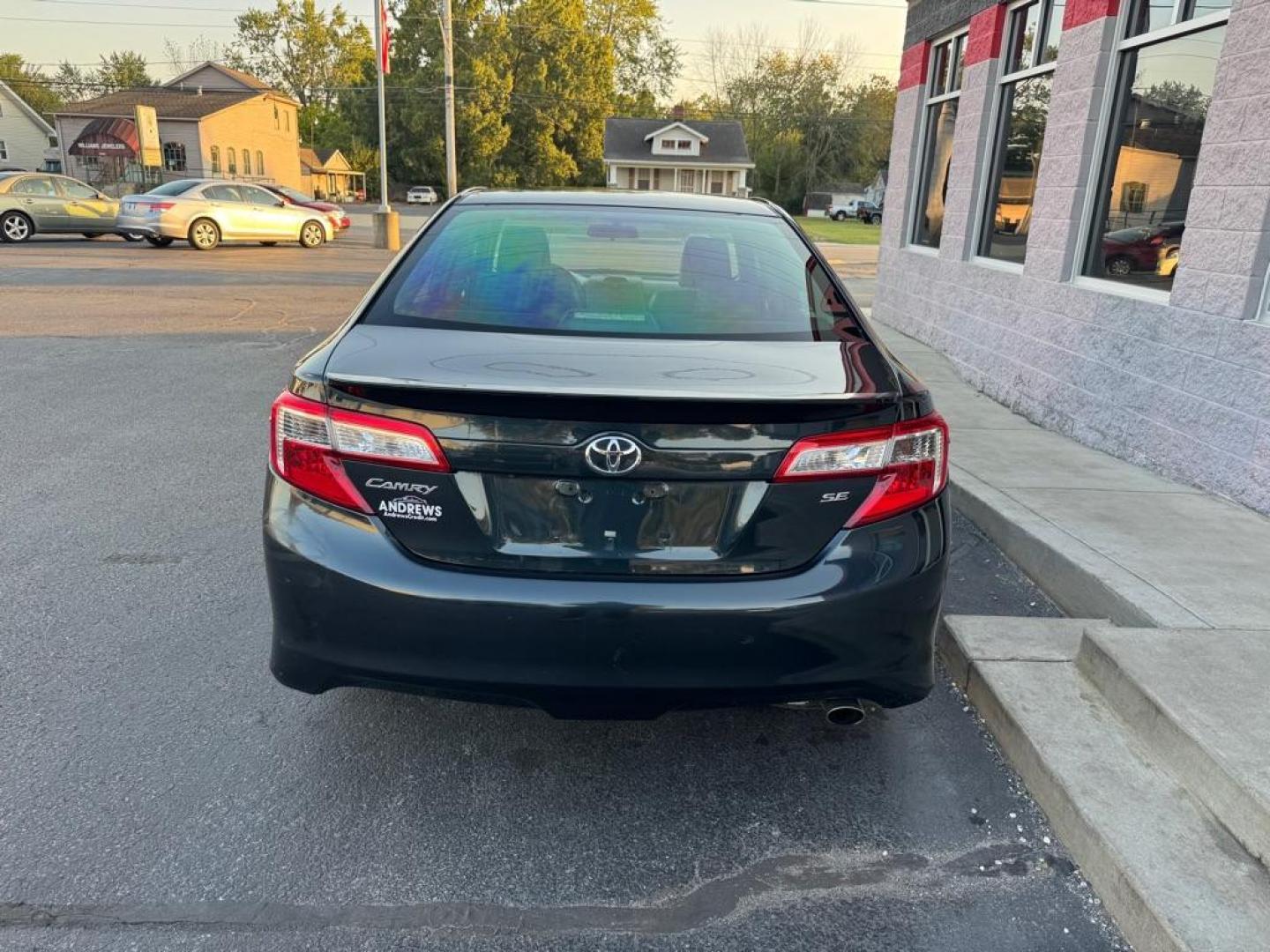 2014 BLACK TOYOTA CAMRY L (4T1BF1FKXEU) with an 2.5L engine, Automatic transmission, located at 3100 Covert Avenue, Evansville, IN, 47714, (812) 473-4492, 37.955418, -87.512238 - Photo#3